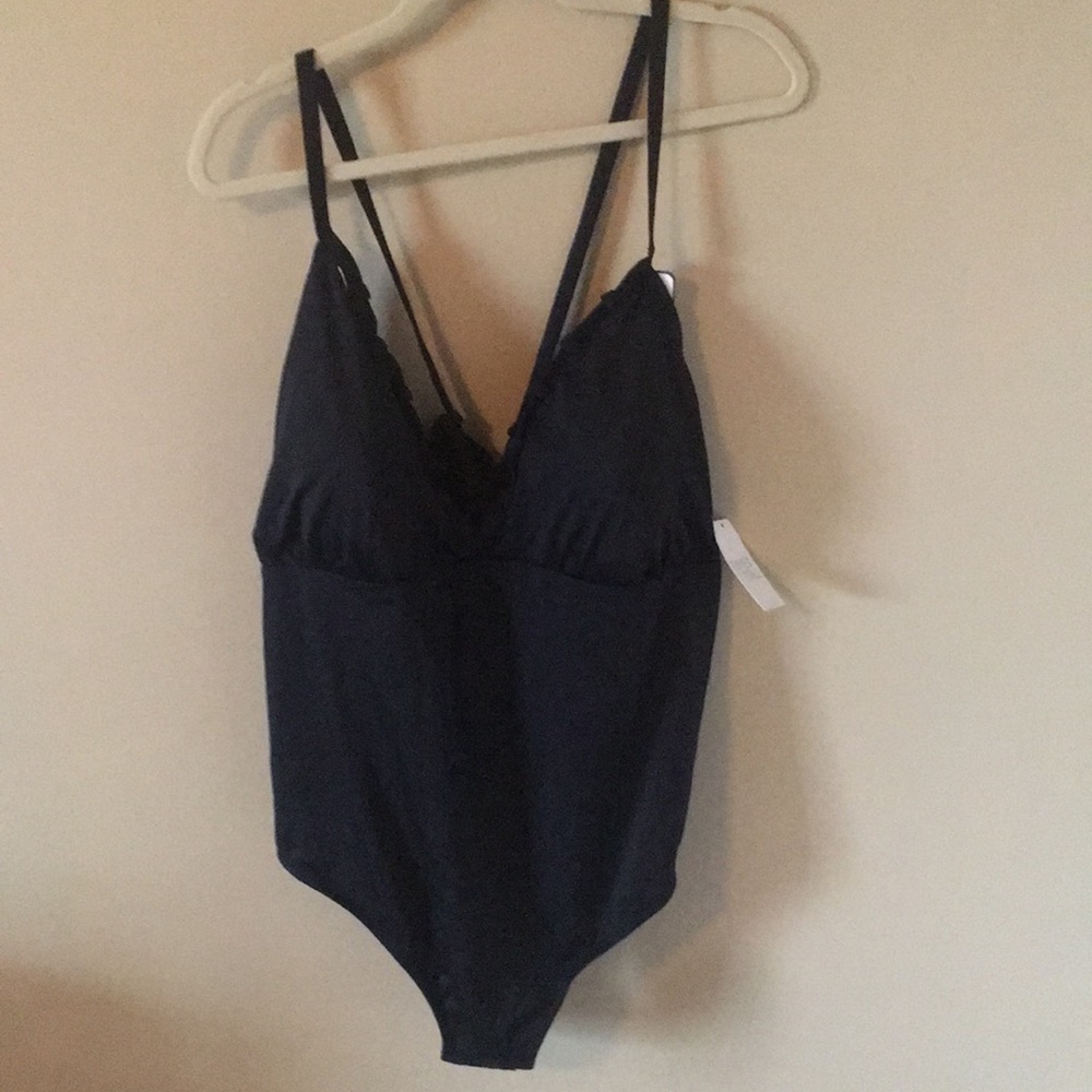 Black one piece swimsuit with lace up back detail